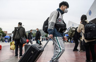 Çin'in Çıngdu şehrinde yurt dışından gelenlerin karantina süresi 2 güne indirildi