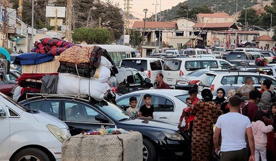 Lübnan'dan kaçan binlerce kişi Suriye'ye gidiyor