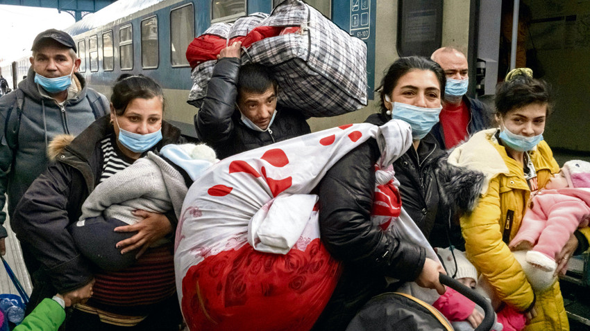 Ukrayna’daki savaştan kaçarak Budapeşte’ye ulaşan bir aile (Fotoğraf: Mauricio Lima/The New York Times)