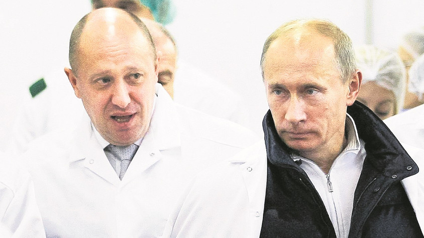 Vladimir Putin ve Yevgeni Prigojin Saint Petersburg’daki bir fabrika açılışında.  /  ALEXEY DRUZHININ / SPUTNIK / AFP via Getty Images