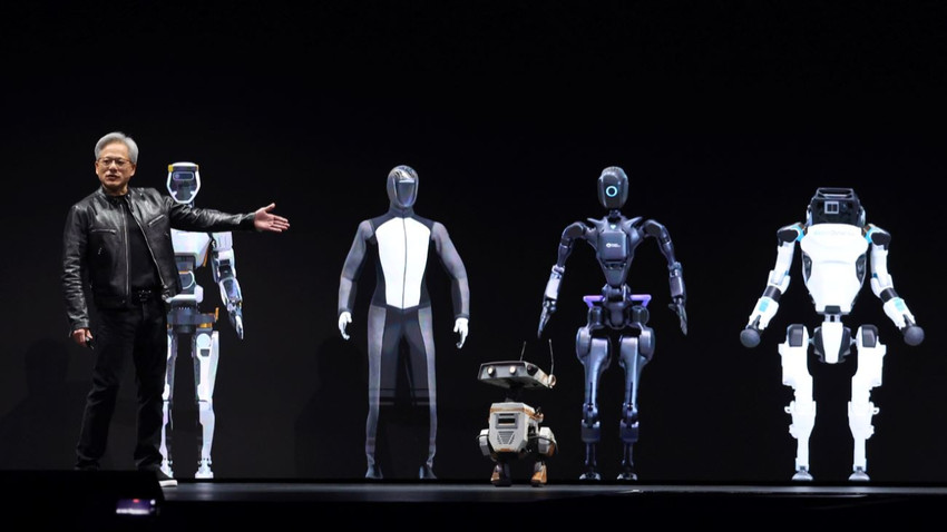 Nvidia CEO’su  Jensen Huang Nvidia çipiyle donanmış  insansı robotları anlatırken (Getty Images)