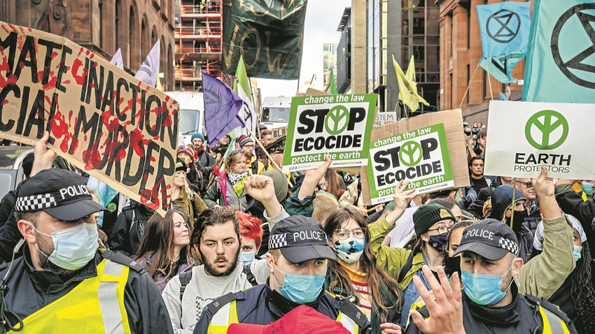 Glasgow’daki BM iklim zirvesinde bir protesto. (Fotoğraf: Andrew Testa/The New York Times)