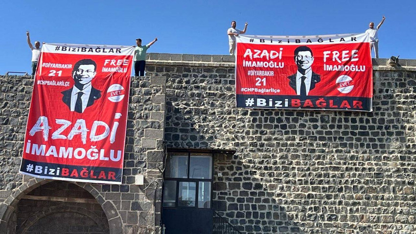 Diyarbakır'da tarihi surlarda Ekrem İmamoğlu pankartı açan kişiler gözaltına alındı